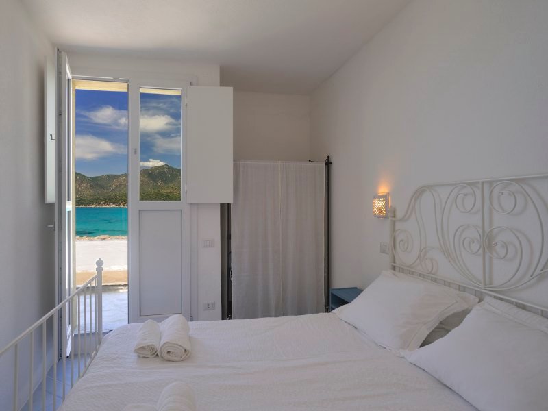 Schlafzimmer 2 mit Doppelbett und Meerblick Schlafzimmer 2 mit Doppelbett und Meerblick